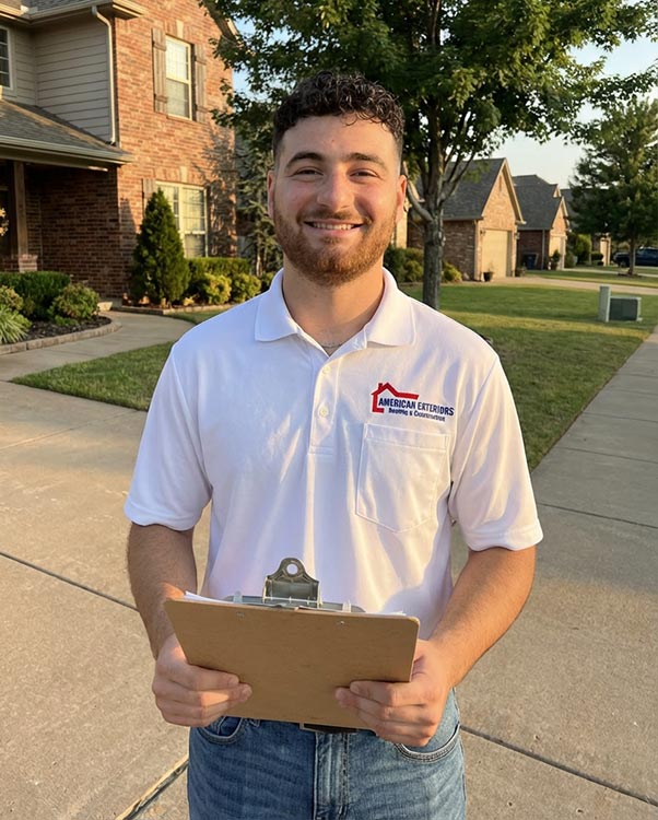 American Exteriors professional roofing technician conducting residential roof inspection