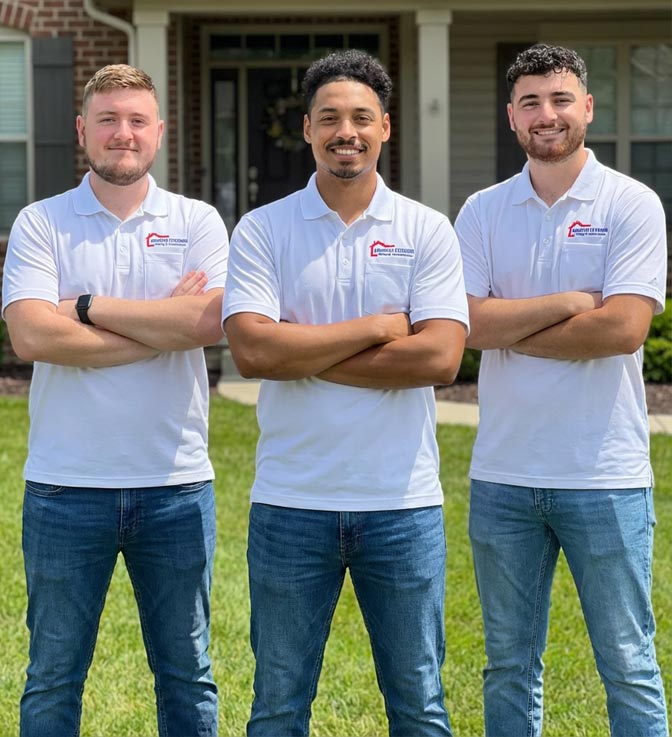 American Exteriors professional roofing team standing together in company uniforms