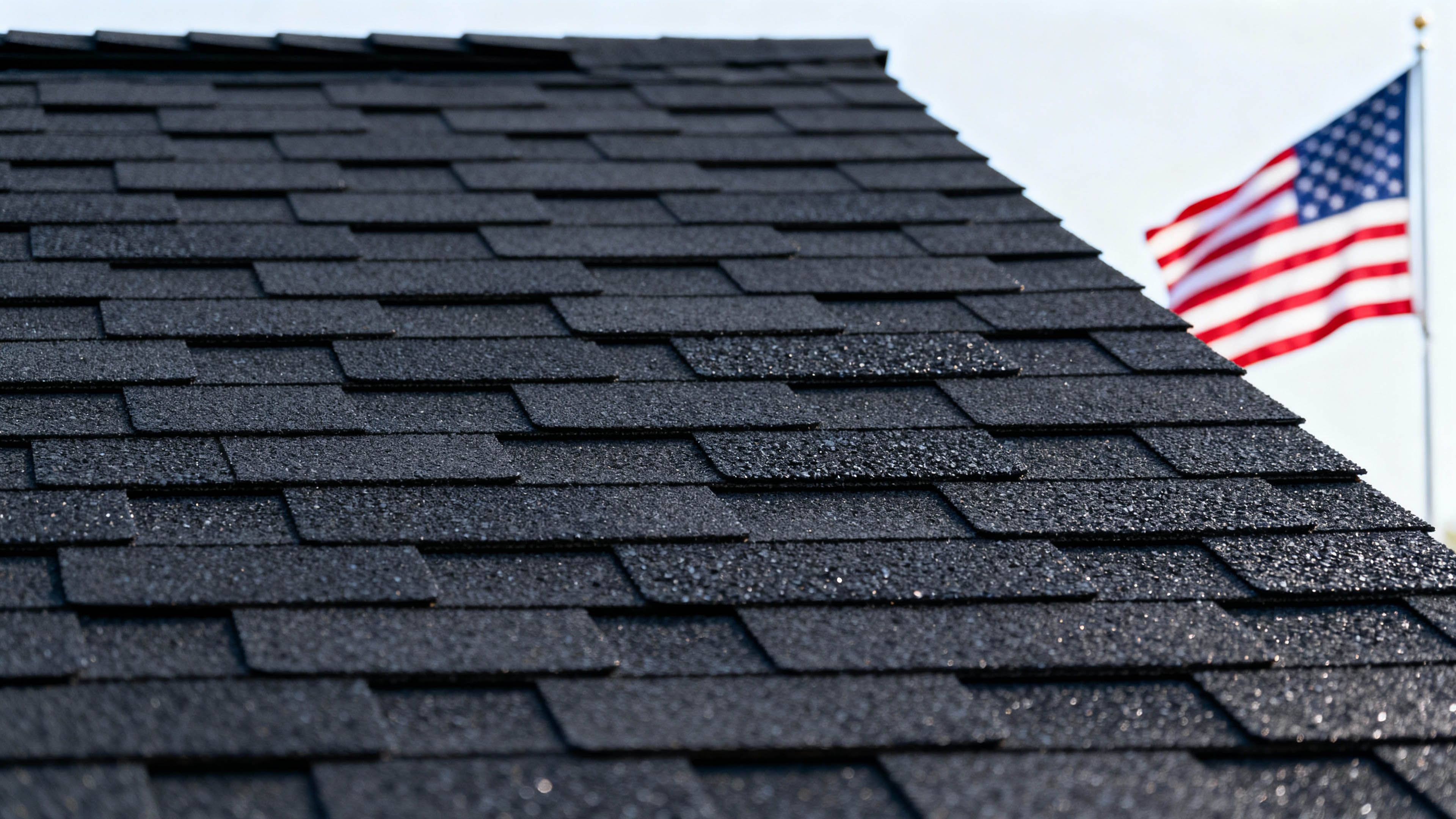 American Exteriors Roofing & Construction - Licensed contractor installing premium asphalt shingles on residential home in Tulsa, Oklahoma